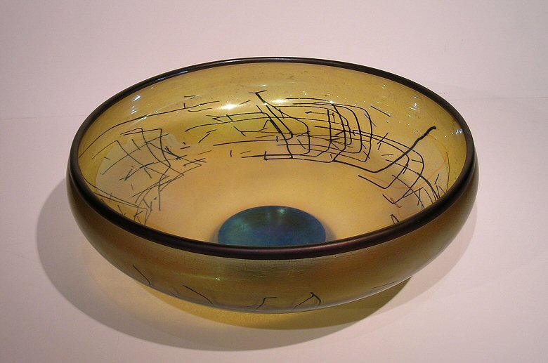Image of art work “Amber and Gold Bowl with Black Threads Pattern”
