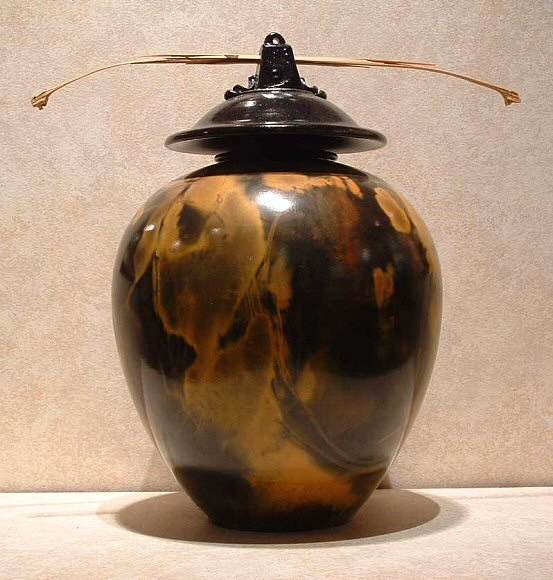 Image of art work “Pit Fired Vase with Lid”